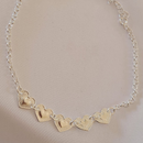 Pulseira Corações Texturizados Banhada em Prata